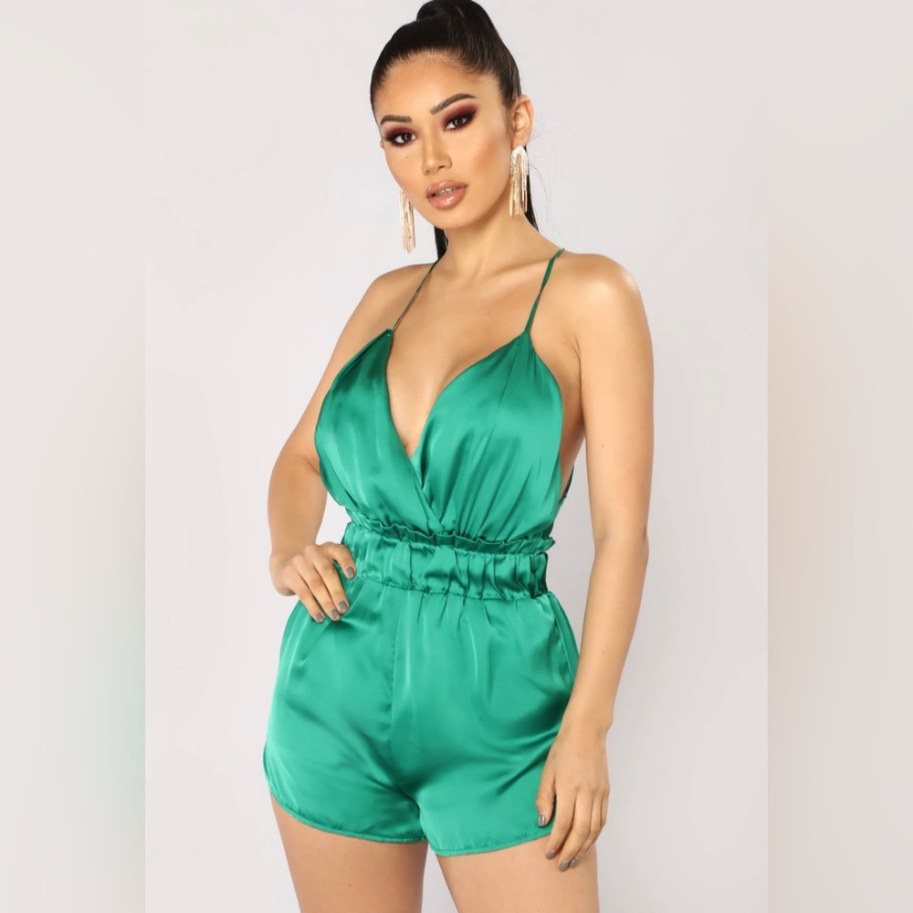 Satin green romper. Backless. Brand New.
